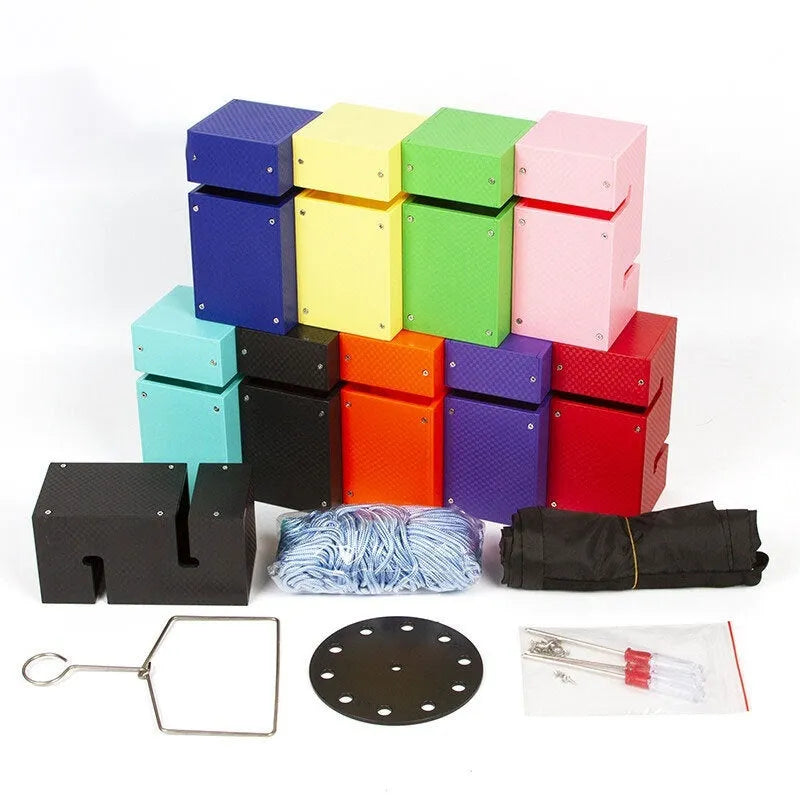 Outdoor team building game equipment set with coloured ABS plastic blocks, ropes, and a hook frame.