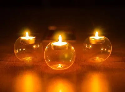 European style round hollow glass candle handmade from hot glass in spherical design