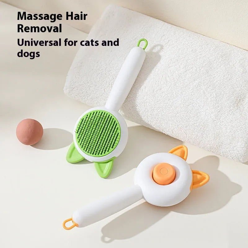 Circular greenish white pet grooming brush with stainless steel teeth and rubber massage nodules.