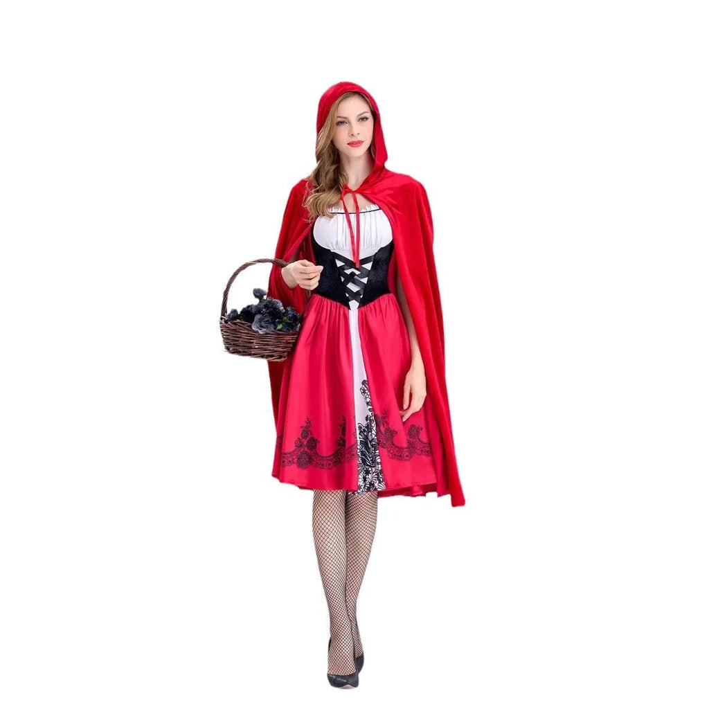 Little Red Riding Hood costume set with dress, shawl, and gloves on a woman standing in a forest scene