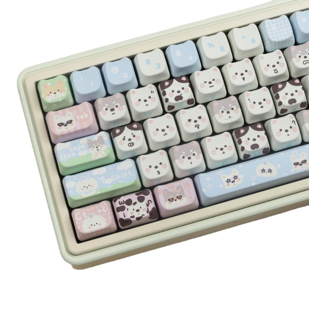 PBT sublimation key cap set showing colourful puppy and cat artwork on mechanical keyboard keys