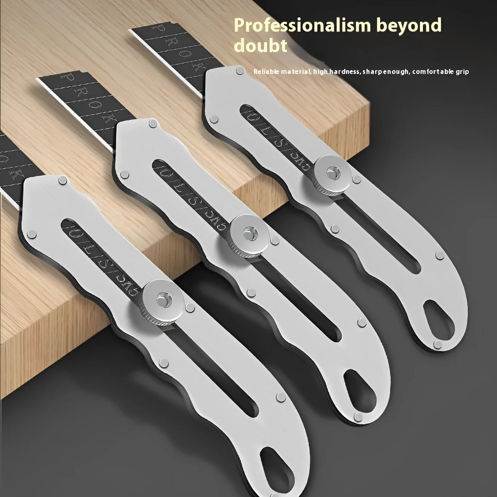 Stainless steel folding art knife with black blade and a set of spare long and trapezoidal blades.