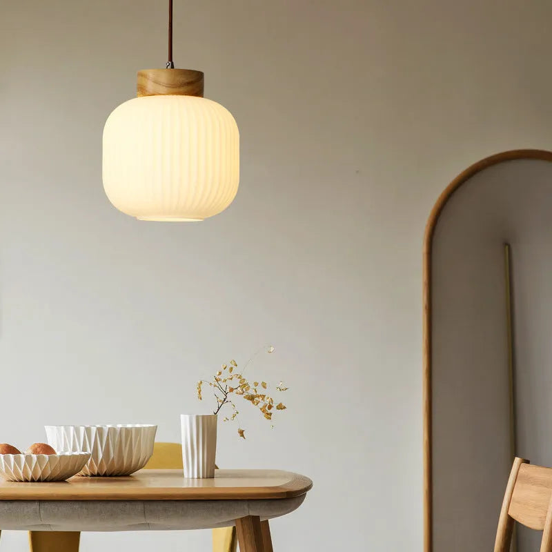 Retro Chinese wooden pendant light with Nordic design in warm light setting