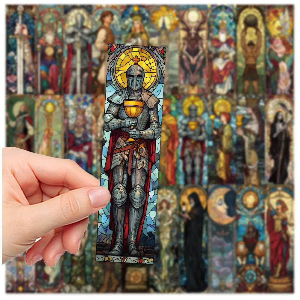 Set of 30 painted glass tarot themed cute style paper bookmarks laid out on a surface