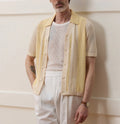 Yellow tencel polo shirt with asymmetric hollow-out design and short sleeves for summer casual wear
