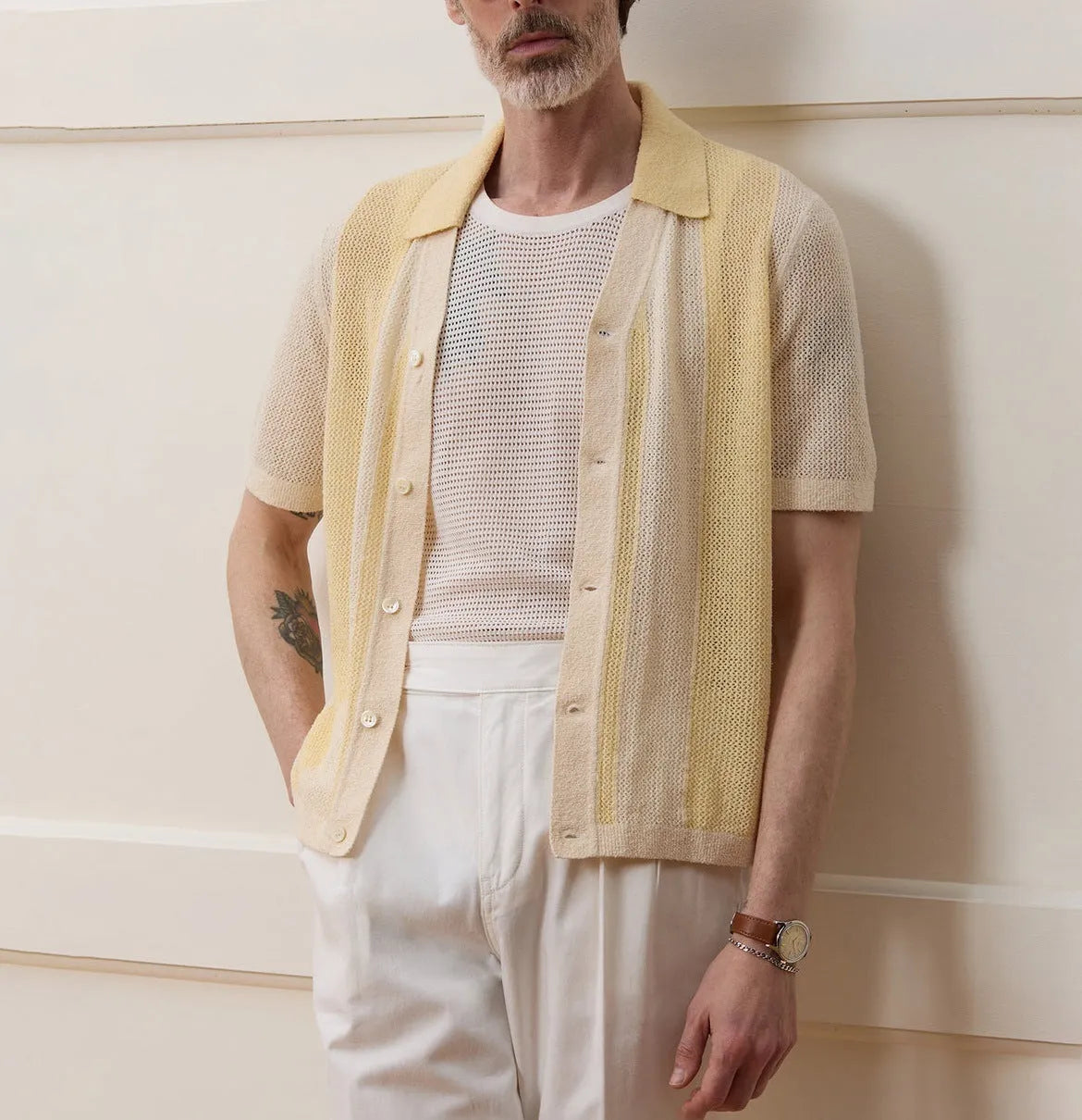Yellow tencel polo shirt with asymmetric hollow-out design and short sleeves for summer casual wear