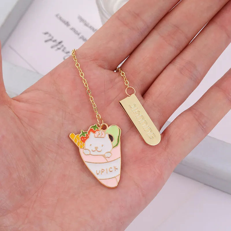 Jane Key Foodie Cute Pet Cat metal bookmark with cartoon pendant, shown in various colour designs.