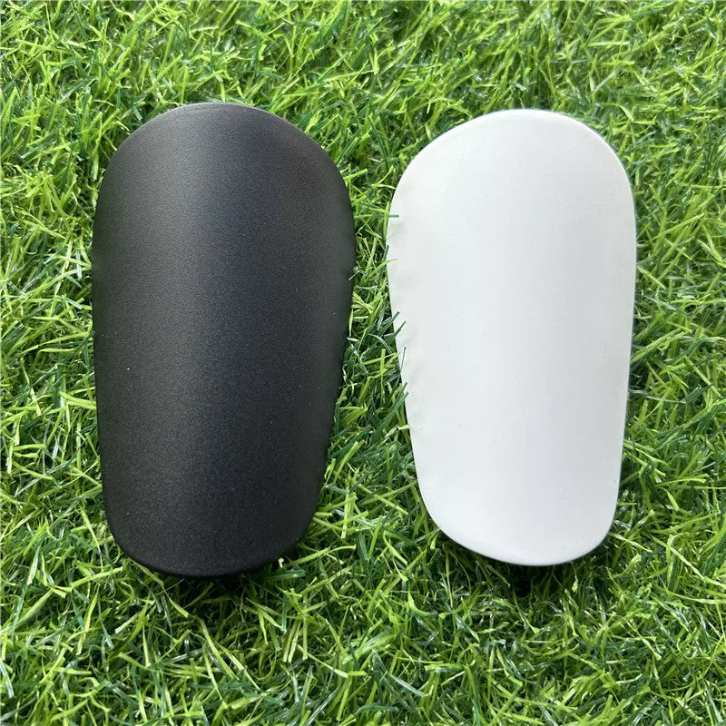 Extra small mini football shin guards in 8x5cm plastic construction