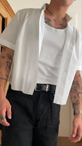 Men's white short sleeve polyester shirt with plain design and cropped length