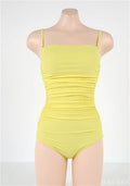 Women's sling style one-piece swimsuit with belly pleats in a solid colour.