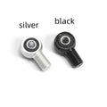 CNC aluminium motorcycle shock fork head riser in black and silver, showing 2CM and 4CM lift options.