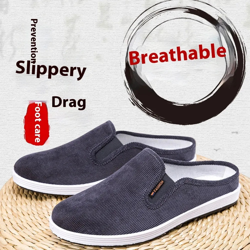 Men's casual slip-on sneakers in black with non-slip rubber sole and mesh lining