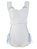 Women's Milky White backless one-piece nylon swimsuit laid flat.