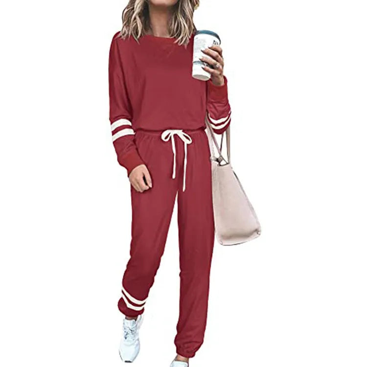 Women's plus size casual suit set with loose-fitting long sleeve top and trousers in solid colour
