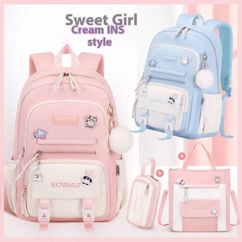 Pink waterproof school backpack for girls with curved shoulder straps, shown with matching pencil case.