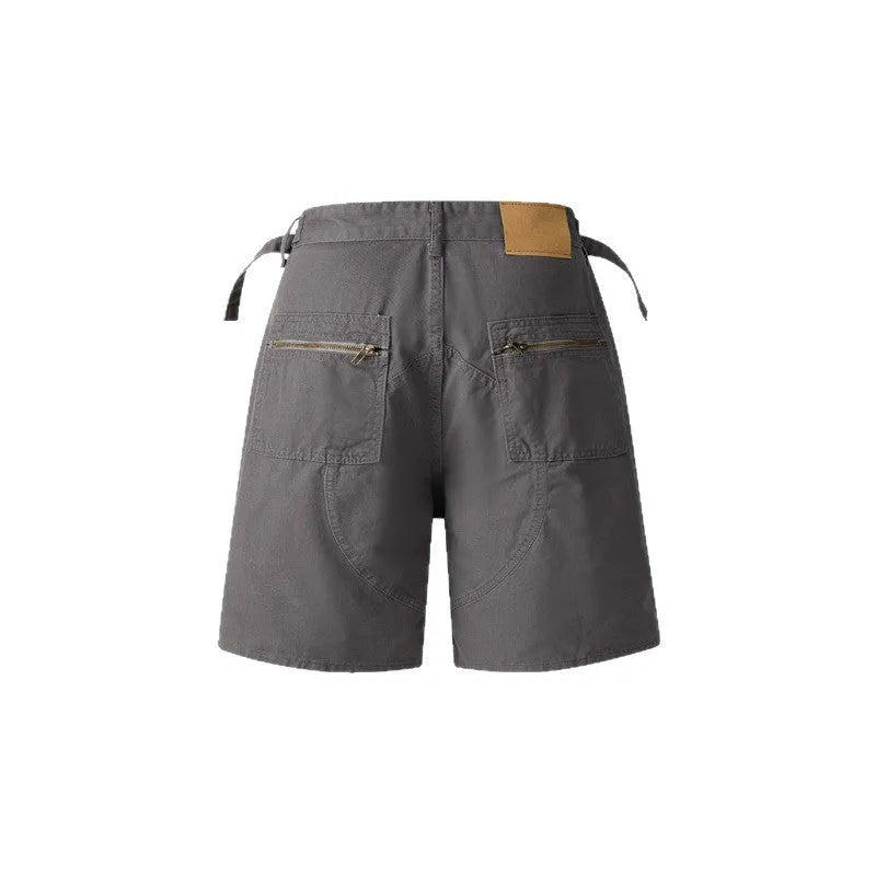 Retro loose-fit washed cotton shorts in grey, shown with a zipper and half elastic band.