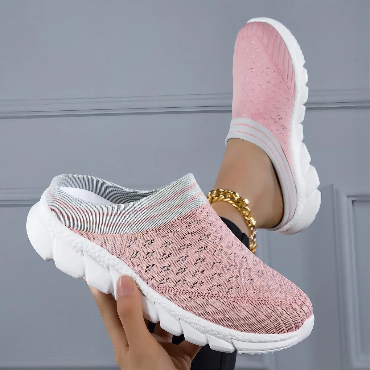 Women's Flyknit semi-slipper casual shoes in striped pattern with hollowed-out details, shown in black, pink, and purple.