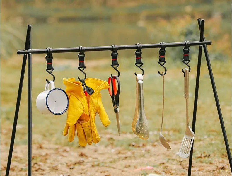 Large foldable aluminium alloy triangle clothes drying rack for camping with side hooks.