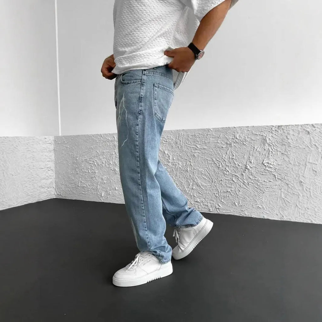 Men's straight-leg denim trousers in loose wide-leg fit with solid colour print and zipper fly