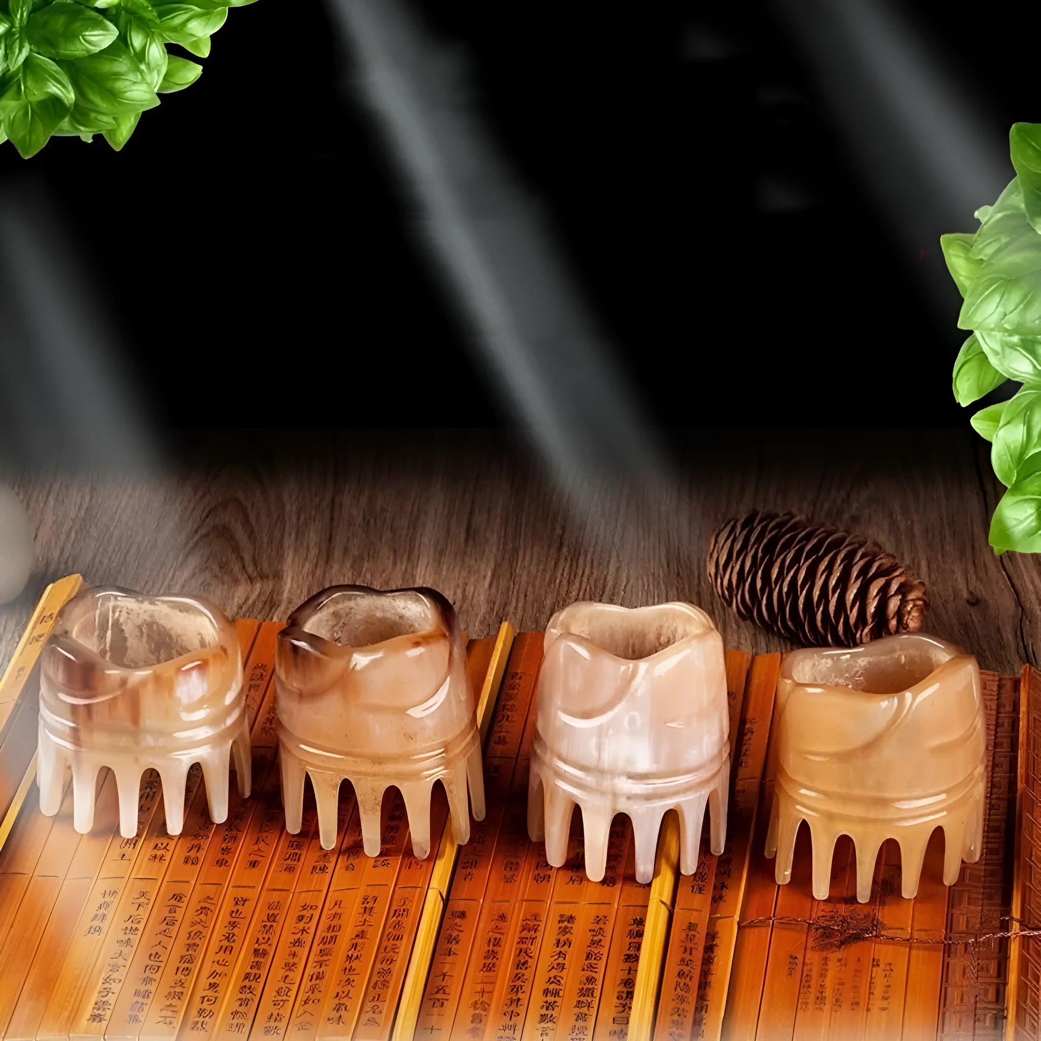 A black horn comb with wide teeth on one side and a pointed tip for scalp massage.