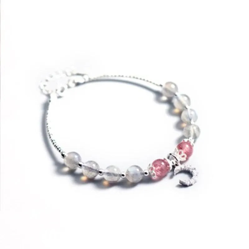 Handmade adjustable moonstone bracelet with crescent moon charm showing 6mm beads and extension chain