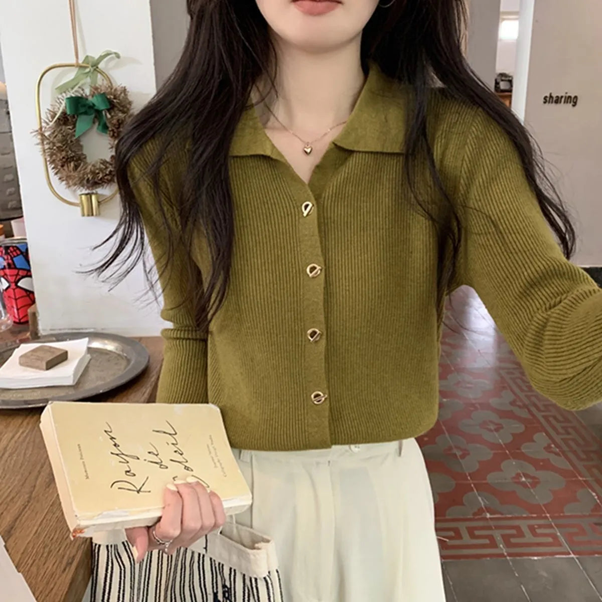 Loose-fitting knitted cardigan in viscose fibre showing long sleeves and neutral colour options