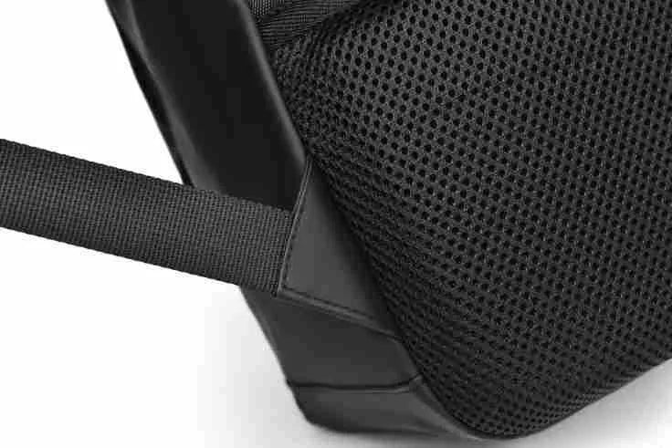 Large black waterproof PU backpack with sewing thread details and separate laptop bag
