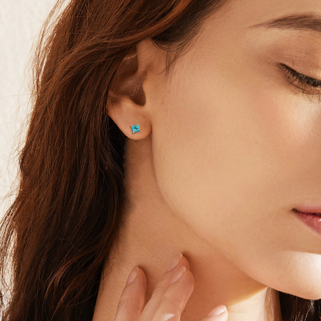 Brass gold-plated drop earrings with pear-shaped candy-coloured zircon stones on copper base