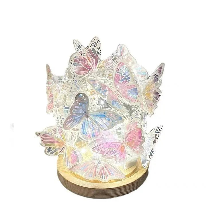 Butterfly night lamp with glass lampshade and raw wood base measuring 12x15cm
