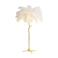 Decorative resin feather floor lamp standing 170cm tall with pink feather details