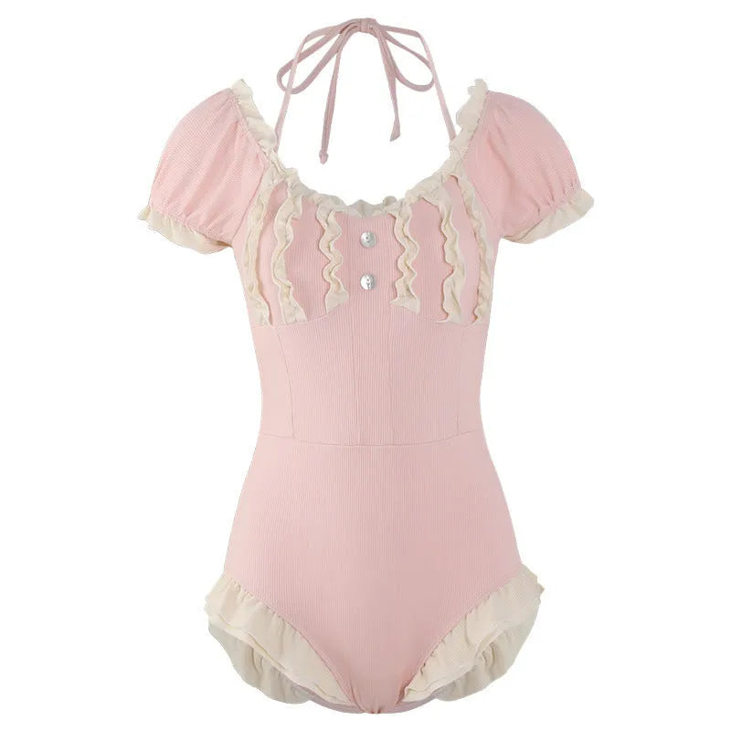 Pink women's Siamese-style one-piece swimsuit on a white background