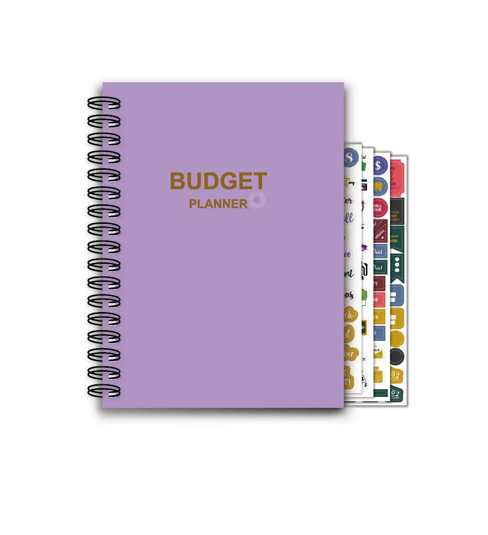 Purple coil-bound financial planning notebook with budgeting stickers and pen on Daolin paper