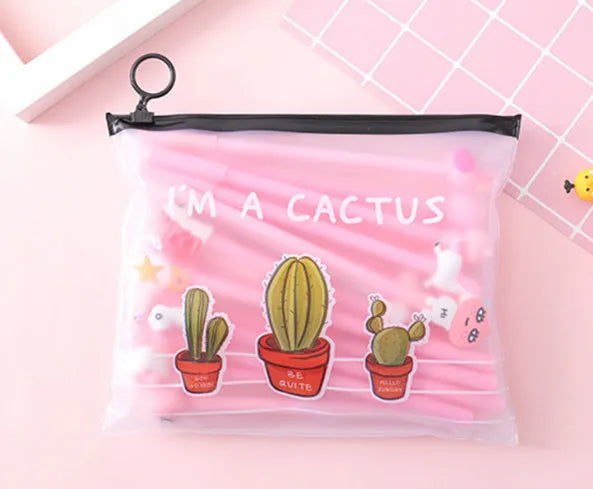 Cartoon cactus-themed ballpoint pen set showing 20 pens with 0.5mm black refills in plastic storage case