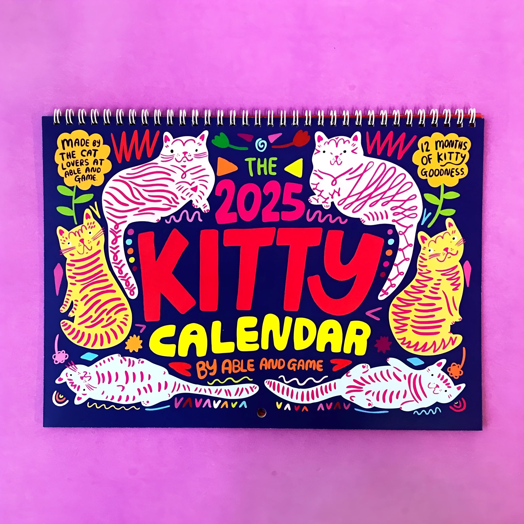 Cat themed yearly wall calendar for 2024 or 2025 on paper