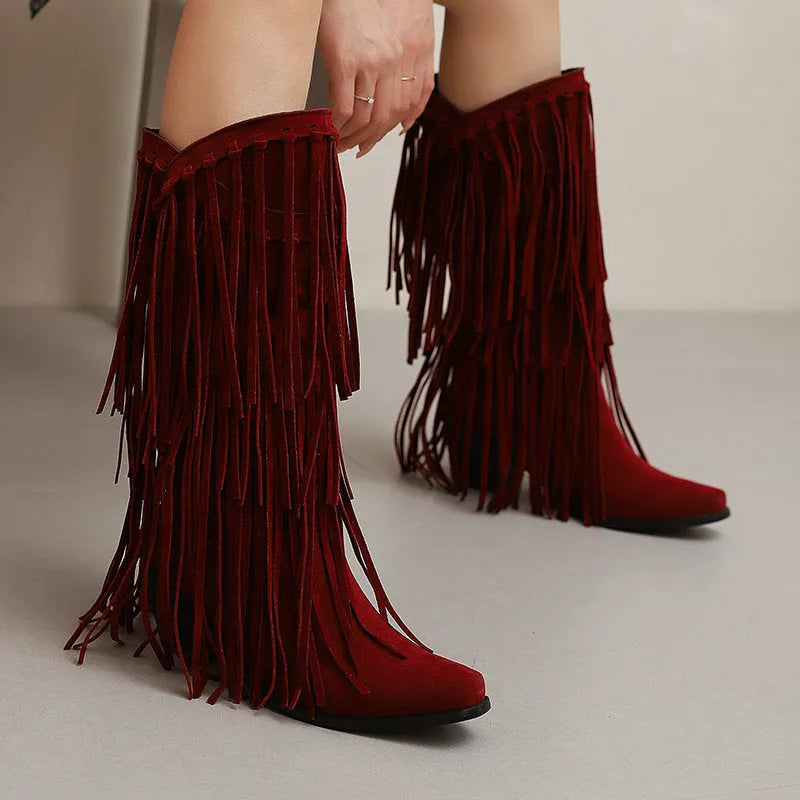Women's beige suede mid-calf boots with a chunky heel, tassel detail, and square toe