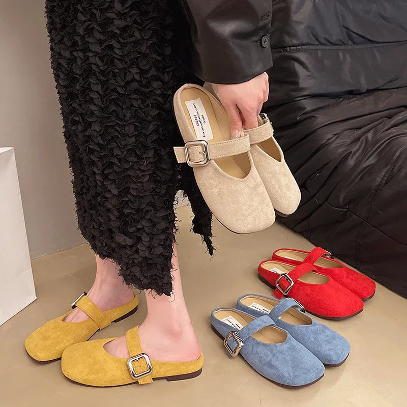 Women's flat apricot PU half slippers with closed square toe and rubber sole.