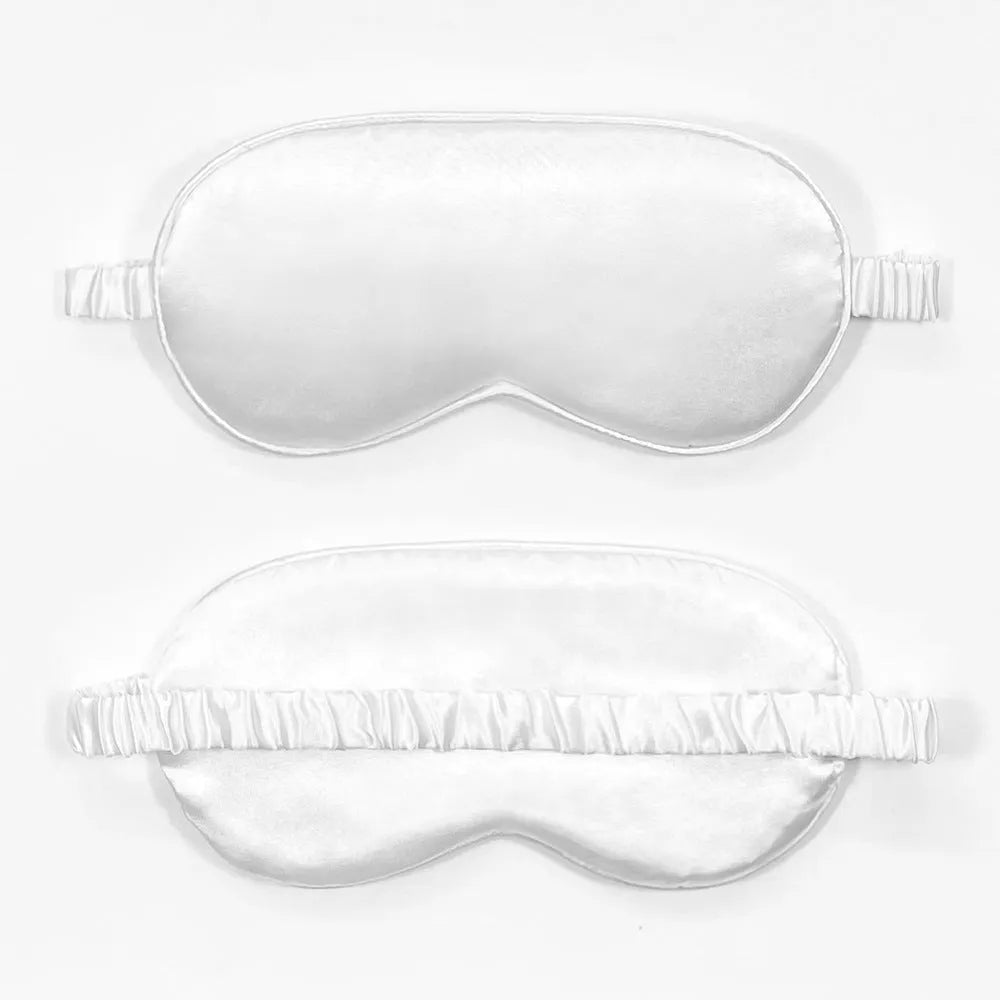 Double-sided rayon elastic satin sleep eyeshade mask in a selection of colours on a white background.