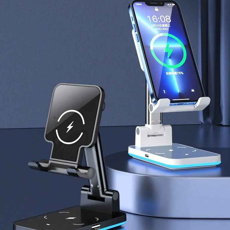 Black and white desktop wireless charging mobile phone holder on a wooden desk.