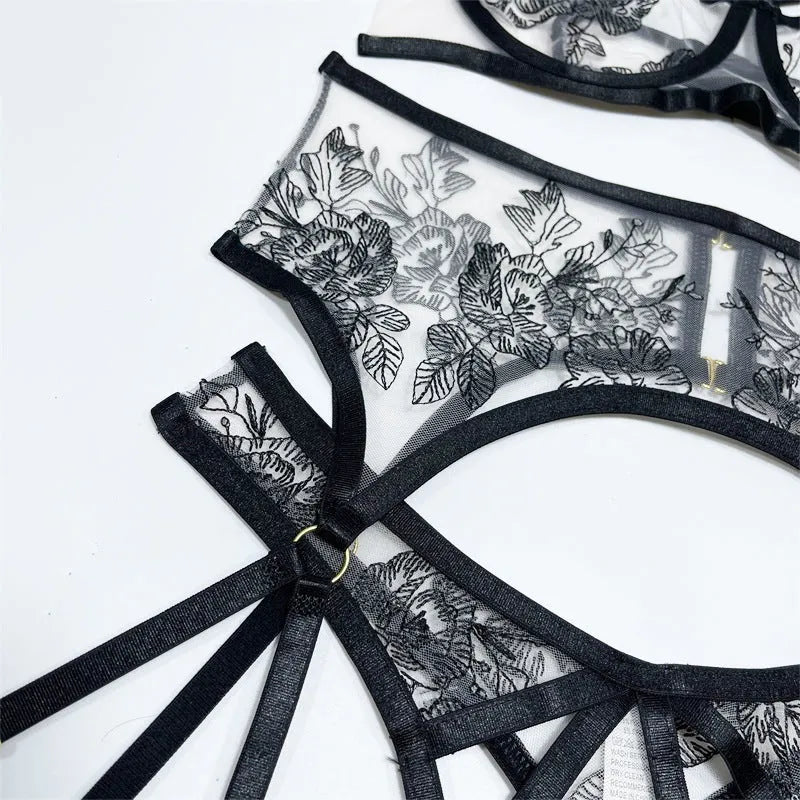 Black lace mesh floral print women's three-piece set with sleeveless top, trousers, and waist ring.