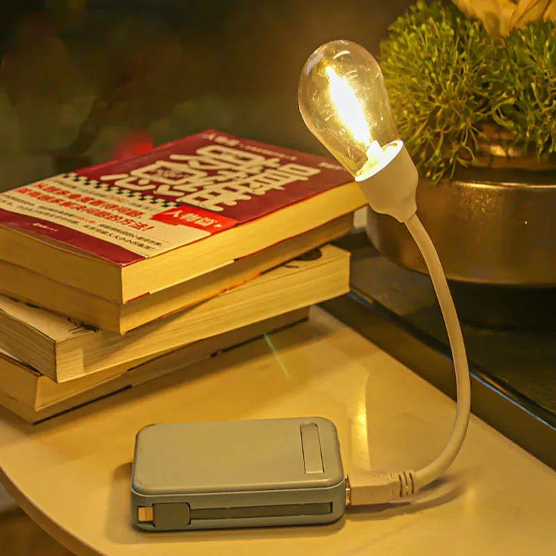 USB rechargeable folding tungsten night light showing compact portable design