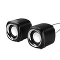 Pair of small black wired desktop computer speakers with volume wheel