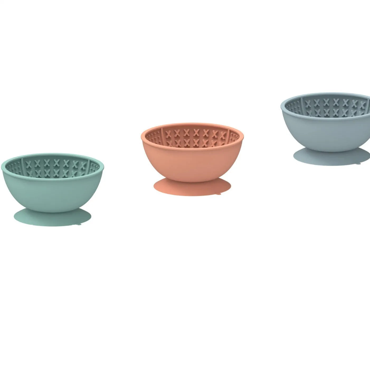 Cyan silicone dog licking mat bowl with suction cup base on a kitchen counter