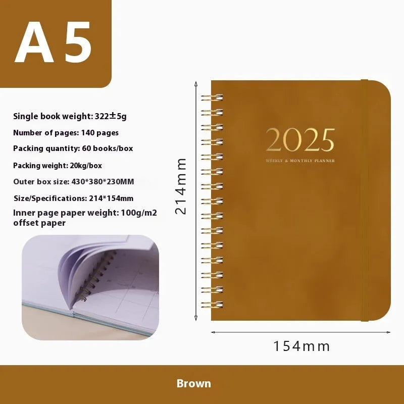 A5 leather notebook with metal coil binding showing multiple colour options including black, blue, brown, and green.