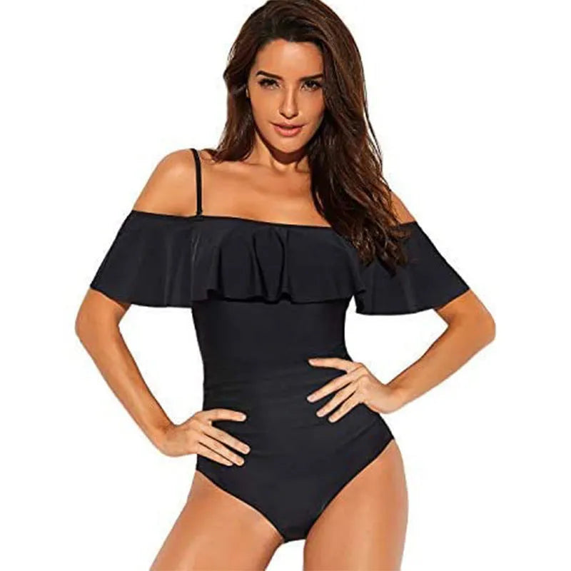 Black one-piece swimsuit with ruffled straps and side cut-out details