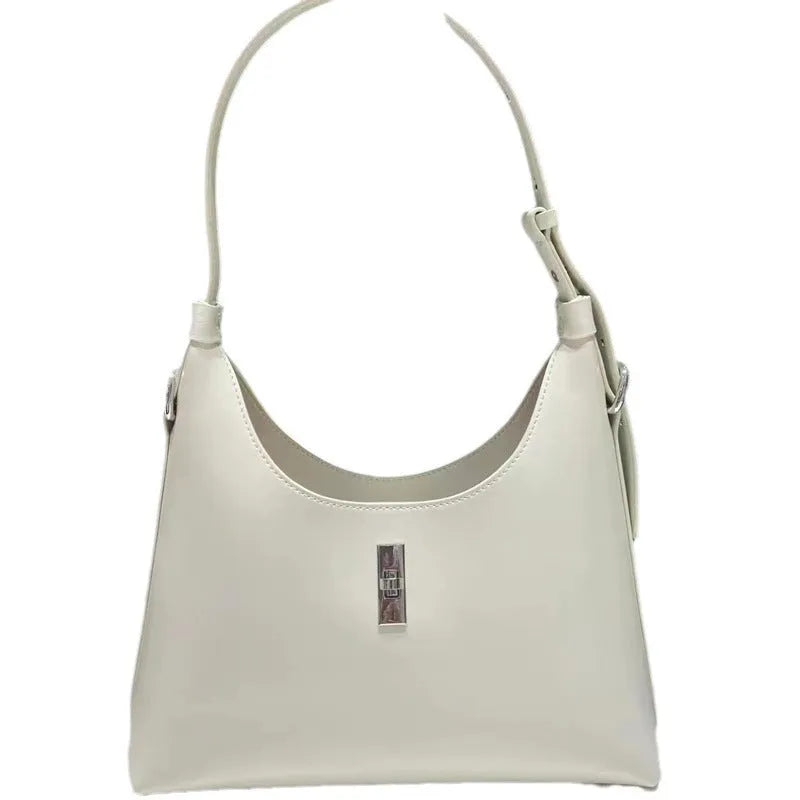 Women's genuine leather dumpling-shaped crossbody shoulder bag in apricot colour with a sandwich pocket.