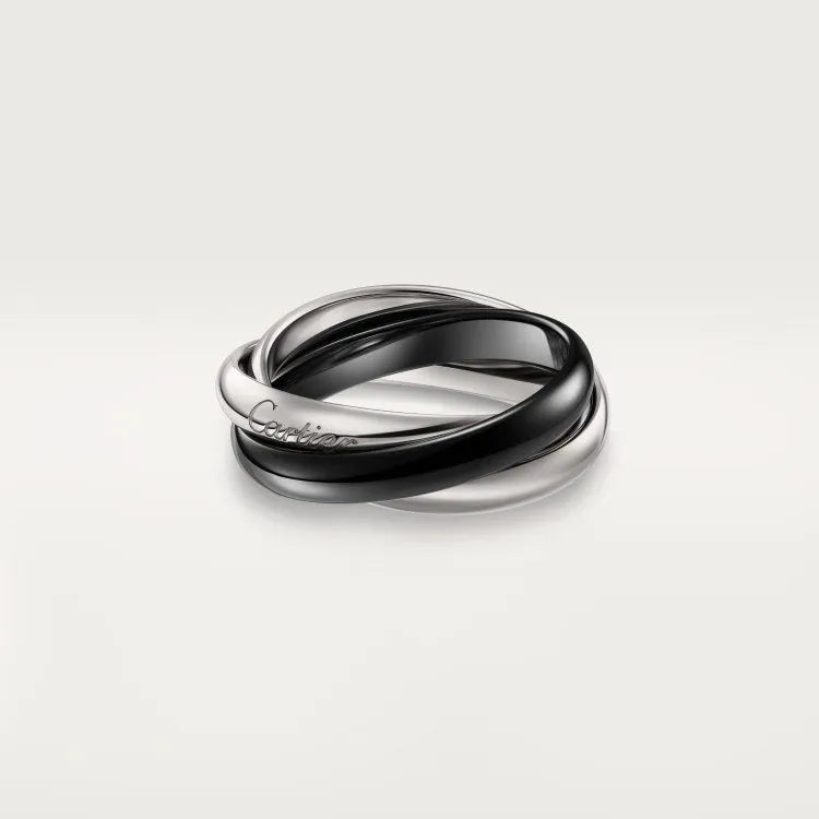 Silver geometric couple ring set with diamond accents on a U-shaped band.