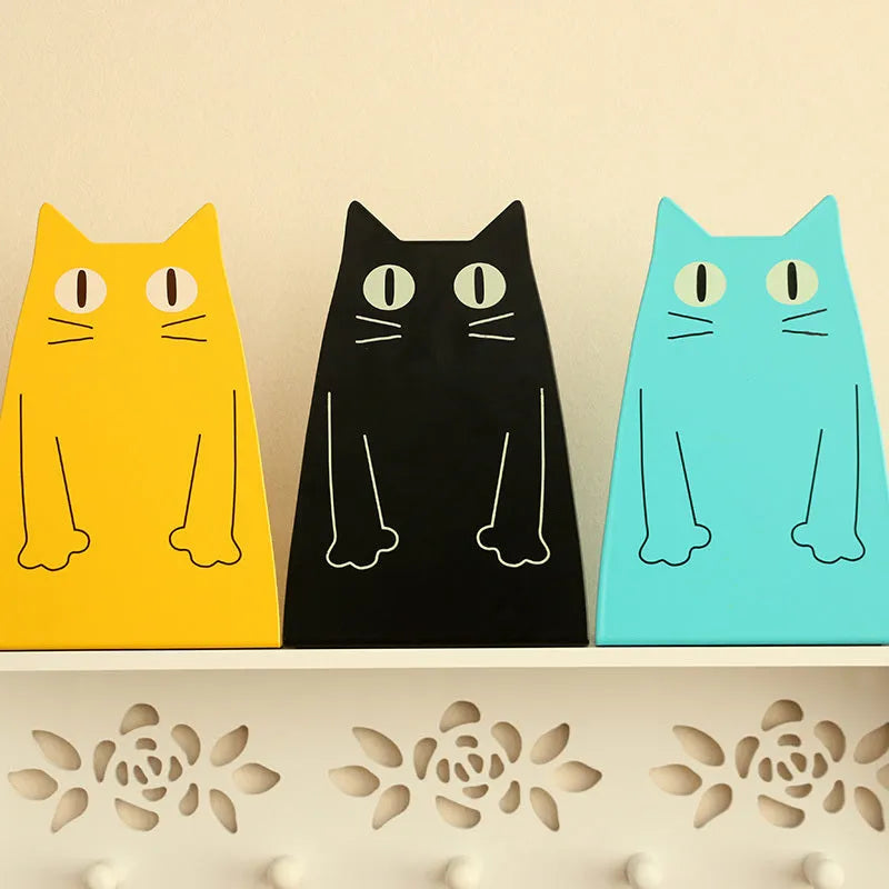 Pair of iron bookends in blue and yellow, each 14 x 20.5 x 10.5cm, on a bookshelf
