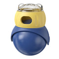 Owl-shaped plastic tumbler cat toy in morandi yellow and blue colours, designed as a puzzle food feeder.