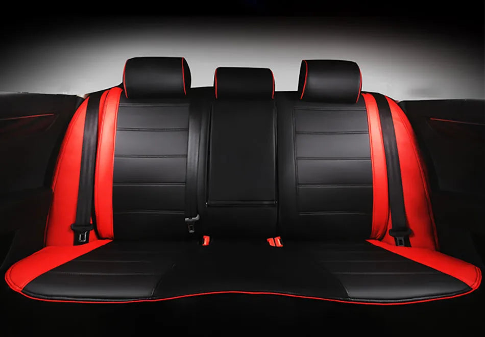 Genuine cow leather car seat cover in a black with red line colour option, showing binding style edge.
