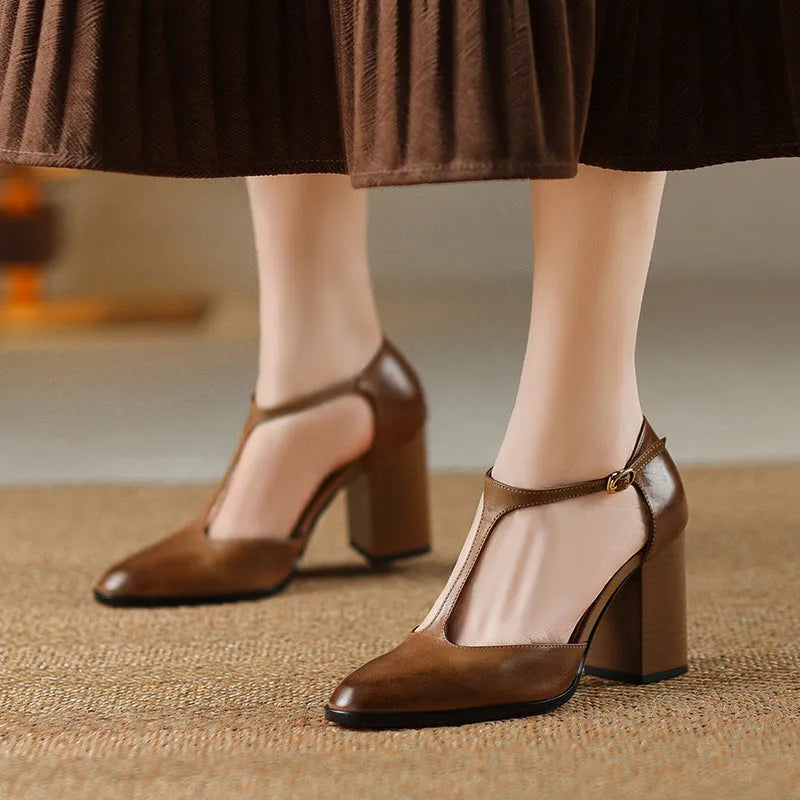 Women's dark brown retro Mary Jane shoes with pointed toe, buckle fastening and hollow design